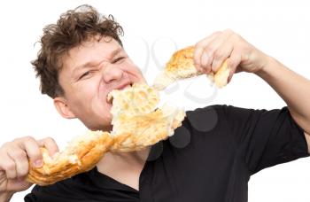 man eats bread on a white background