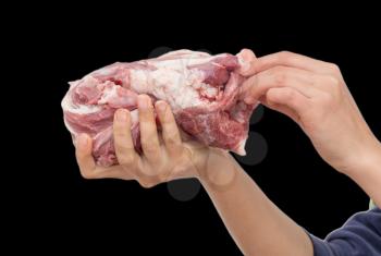 fresh meat in hand on a black background