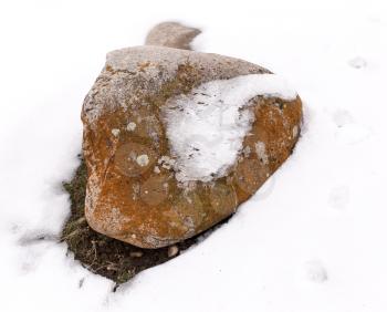 stones in the snow on the nature