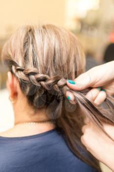 weave braids in the beauty salon