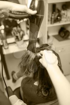blow-drying in a beauty salon