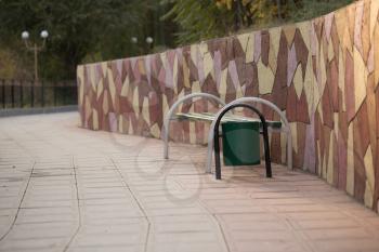 bench in the park with an urn