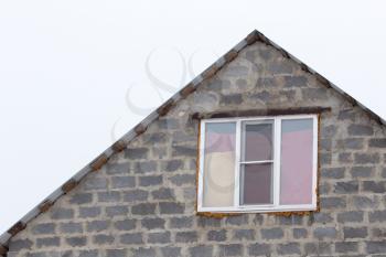 window in a new brick house