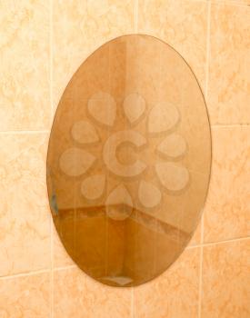 mirror on the tiled wall