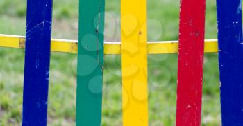 multicolored wooden fence as a backdrop