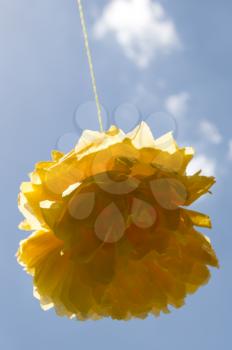 yellow bow on a background of blue sky