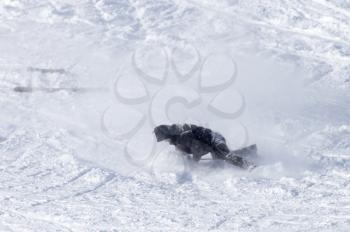 snowboarder fell in the snow