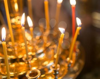 candles burning in orthodox church