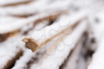 firewood in the snow in the winter