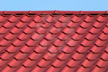 red roof tiles on the roof as a background