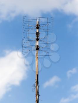 TV antenna on a background of blue sky