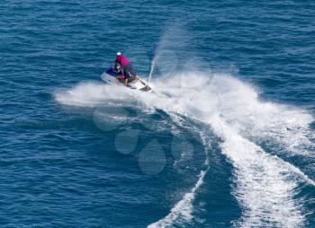 jet ski on the surface of the water at a speed of