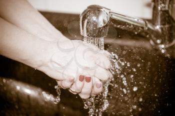 hand washing with tap water