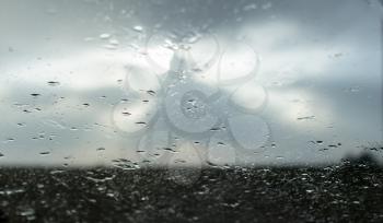raindrops on a windshield of car