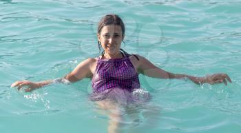 girl in a bathing suit in the water park