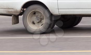 car wheel in motion on the road