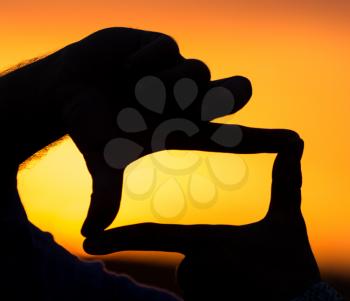 photo frame silhouette at sunset