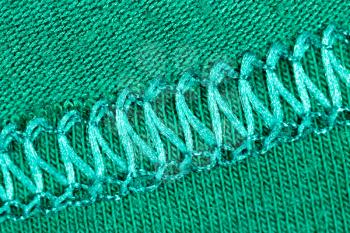 green fabric as a background. macro
