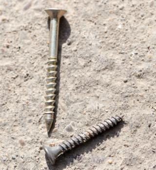 screw on the ground. macro