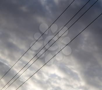 electrical wires on the dawn of the sun