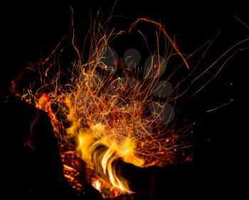 fire with sparks on a black background