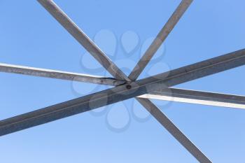 metal construction on a background of blue sky