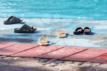 shoes by the pool