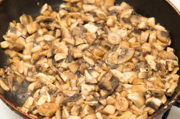 mushrooms fried in a pan