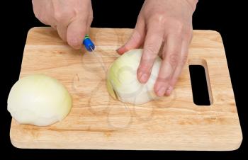 cook onion cut on a board on a black background