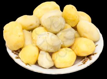 boiled potatoes on a black background