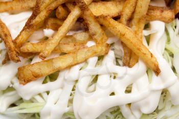 mayonnaise french fries as a background