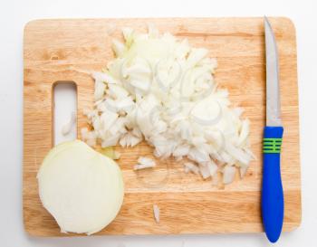 onions on a board on a white background