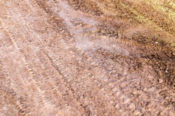 track from a car in a dirty ground