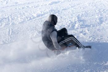 the guy riding the hills on sleds