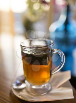 A glass of mint tea in a restaurant .