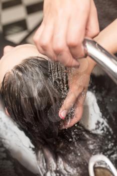 Washing of female hair in a beauty salon