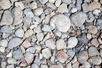 Round stones on nature as an abstract background