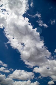 Beautiful clouds against blue sky as background .