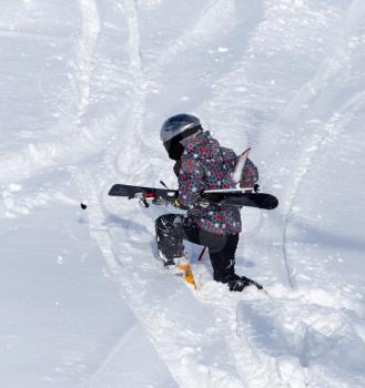 Skier skiing in the snow in winter