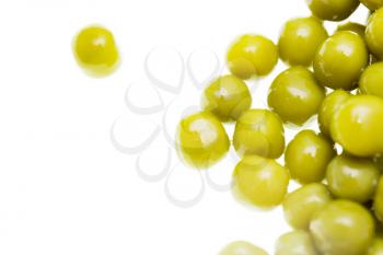 Pickled green peas isolated on white background .