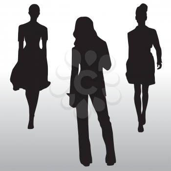 Royalty Free Clipart Image of Silhouettes of Three Women