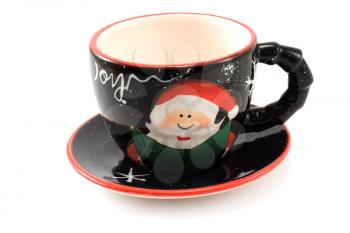 Royalty Free Photo of a Christmas Cup and Saucer