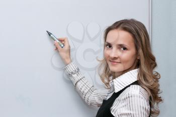 Royalty Free Photo of a Woman Holding a Marker