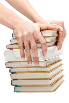 Royalty Free Photo of a Woman Holding a Pile of Books