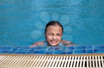 Royalty Free Photo of a Girl in a Swimming Pool