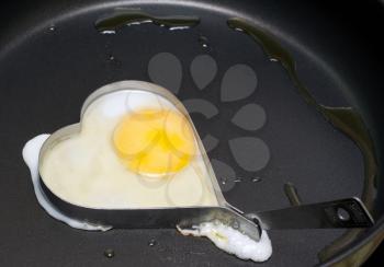 Royalty Free Photo of a Fried Egg in a Pan