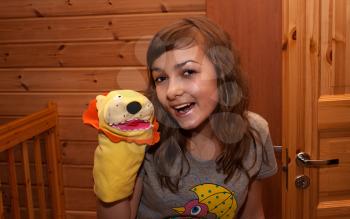Royalty Free Photo of a Girl With a Puppet