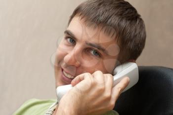 Royalty Free Photo of a Man Talking on the Telephone