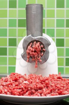 Royalty Free Photo of a Meat Grinder With Meat