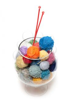 Royalty Free Photo of a Bunch of Yarn and Knitted Needles